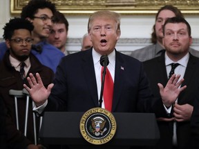 President Donald Trump speaks in the State Dining Room of the White House in Washington, Monday, March 4, 2019, as he welcomes 2018 NCAA FCS College Football Champions, The North Dakota State Bison.