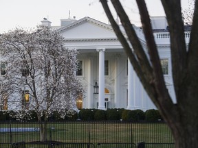 The White House is seen in Washington, Sunday, March 24, 2019. Special counsel Robert Mueller closed his long and contentious Russia investigation with no new charges, ending the probe that has cast a dark shadow over Donald Trump's presidency.