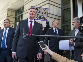 Kevin Downing, Paul Manafort's defense attorney, speaks to reporters after Manafort was sentenced at the U.S. District Court in Washington, Wednesday, March 13, 2019.