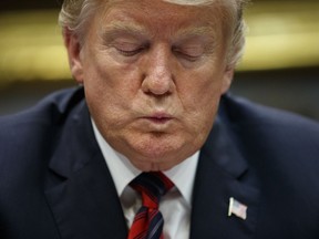 President Donald Trump listens during a briefing on drug trafficking at the southern border in the Roosevelt Room of the White House, Wednesday, March 13, 2019, in Washington. Trump said during the event the U.S. is issuing an emergency order grounding all Boeing 737 Max 8 and Max 9 aircraft "effective immediately," in the wake of the crash of an Ethiopian Airliner that killed 157 people.