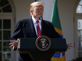 President Donald Trump speaks during a news conference with Brazilian President Jair Bolsonaro in the Rose Garden of the White House, Tuesday, March 19, 2019, in Washington.
