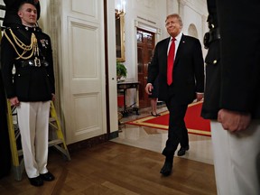 President Donald Trump arrives for an event for a signing of an executive order requiring colleges to certify that their policies support free speech as a condition of receiving federal research grants, Thursday March 21, 2019, in the East Room of the White House in Washington.