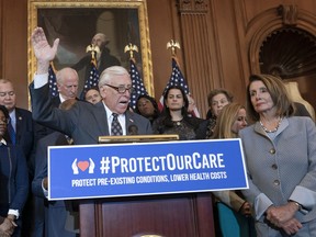 House Majority Leader Steny Hoyer, D-Md., joined at right by Speaker of the House Nancy Pelosi, D-Calif., speaks at an event to announce legislation to lower health care costs and protect people with pre-existing medical conditions, at the Capitol in Washington, Tuesday, March 26, 2019. The Democratic action comes after the Trump administration told a federal appeals court that the entire Affordable Care Act, known as "Obamacare," should be struck down as unconstitutional.