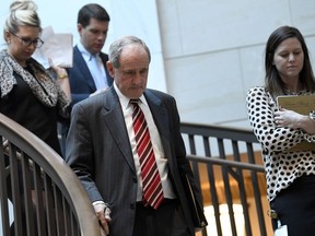 Senate Foreign Relations Committee Chairman Sen. Jim Risch, R-Idaho, left, heads to a closed-door briefing on Capitol Hill in Washington, Monday, March 4, 2019, on the global Magnitsky Act investigation related to the killing of journalist Jamal Khashoggi.