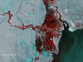 This Tuesday, March 19, 2019 photo taken from Copernicus Sentinel-1 and provided by the European Space Agency, ESA, shows the extent of flooding, depicted in red, around the port town of Beira in Mozambique. following cyclone force winds and heavy rain near the coastal city.