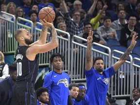 Orlando Magic guard Evan Fournier (10) goes up for a 3-pointer during the first half of the team's NBA basketball game against the New Orleans Pelicans on Wednesday, March 20, 2019, in Orlando, Fla.