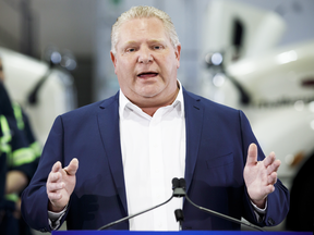 Ontario Premier Doug Ford speaks to reporters in Cambridge, Ont., on March 13, 2019.