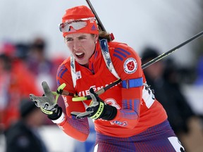 FILE - In this Feb. 11, 2016, file photo, Susan Dunklee, of Barton, Vt., skis to a second-place finish in the sprint competition during the World Cup Biathlon, in Presque Isle, Maine. The Americans have never won an Olympic medal in biathlon. The organization for the sport that combines cross-country skiing and rifle shooting is trying to change that with a revamped blueprint.