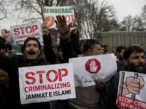 Kashmiri supporters of the Peoples Democratic Party (PDP) shout slogans against banning of Jama'at-e-Islami, the largest political and religious group in Indian-controlled Kashmir, during a protest in Srinagar, Indian controlled Kashmir, Saturday, March 2, 2019. India has banned the group in Kashmir in a sweeping and ongoing crackdown against activists seeking the end of Indian rule in the disputed region amid most serious confrontation between India and Pakistan in two decades.