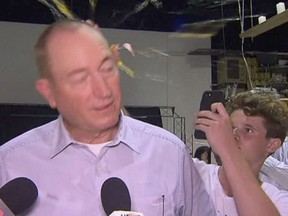 n this image made from video, a teenager breaks an egg on the head of Senator Fraser Anning while he holds a press conference, Saturday, March 16, 2019, in Melbourne, New Zealand. Following the mass shootings on Friday, Anning came under sharp criticism over tweets including one that said: 'Does anyone still dispute the link between Muslim immigration and violence?'