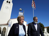 Eva Schloss, left, the stepsister of Anne Frank and a Holocaust survivor, and Rabbi Reuven Mintz leave Newport Harbor High School after a meeting with a group of students on March 7, 2019, in Newport Beach, Calif.