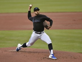 Marlins pitcher Pablo Lopez throws during the first inning of the team's baseball game against the Colorado Rockies in Miami on Saturday, March 30, 2019.