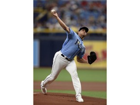Tampa Bay Rays starting pitcher Yonny Chirinos throws during the first inning of a baseball game against the Houston Astros, Sunday, March 31, 2019, in St. Petersburg, Fla.