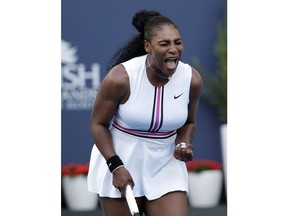 Serena Williams reacts during her match against Rebecca Peterson, of Sweden, at the Miami Open tennis tournament, Friday, March 22, 2019, in Miami Gardens, Fla.