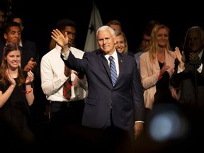 Vice President Mike Pence waves to the crowd as he takes the stage to speak at Ave Maria University on Thursday, March 28, 2019, in Ave Maria, Fla.