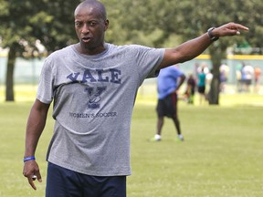 FILE - In a September 2016 file photo, Yale's women's head soccer coach Rudy Meredith gives pointers to players during a scrimmage in Ocala, Fla. Meredith is expected to plead guilty in federal court, Thursday, March 28, 2019, to taking bribes in exchange for pretending applicants were athletic recruits.