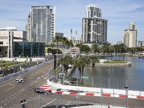 Cars round Turn 10 during a practice session at the Grand Prix of St. Petersburg auto race in St. Petersburg, Fla., Friday, March 8, 2019.