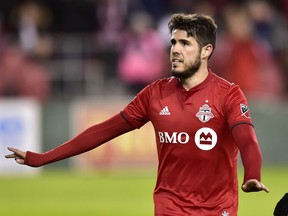 Toronto FC's Alejandro Pozuelo celebrates after scoring on a penalty shot against New York City during second half MLS action in Toronto, Friday, March 29, 2019.