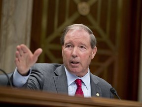 FILE - This May 16, 2018 file photo shows ranking Member Sen. Tom Udall, D-N.M., questioning Environmental Protection Agency Administrator Scott Pruitt on Capitol Hill in Washington. Udall says he will not seek re-election in 2020 in a move that opens up a securely Democratic seat to competition. Udall announced the end of a 20-year career on Capitol Hill on Monday, March 25, 2019, in a statement.