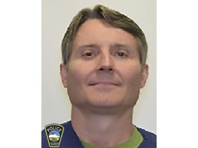 This photo released by the Colorado Springs Police Department on Friday, March 29, 2019 shows James William Hanlon. Authorities said Hanlon, 53, is suspected of killing his neighbor in Colorado Springs, Colo., and the incident was recorded by the victim's cell phone. (Colorado Springs Police Department via AP)