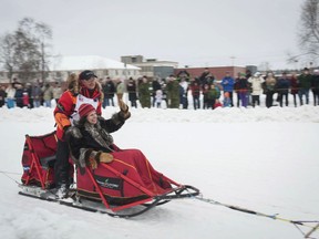 FILE - In this March 3, 2018, file photo, defending Iditarod champion Mitch Seavey rounds a turn during the ceremonial start of the Iditarod Trail Sled Dog Race in Anchorage, Alaska. The world's foremost sled dog race kicks off its 47th running this weekend as organizers and competitors strive to push past a punishing two years for the image of the sport. Some of the drama has been resolved for Alaska's Iditarod Trail Sled Dog race.