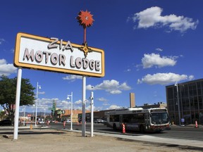 FILE - This May 11, 2017, file photo, shows one of the neon signs that used to light the way along Route 66 in Albuquerque, N.M. Route 66, the American Mother Road that once connected motorists from Illinois to California, may lose its place in a National Park Service's preservation program, ending years of efforts aimed at reviving old tourist spots in struggling towns.