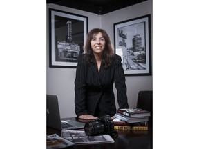 In this October 24, 2018, photo provided by David Fearn, is Donna Balancia in her office in Los Angeles. The college bribery scandal has laid bare the stress and even desperation that many families experience when their children are going through the ultra-competitive process of applying to top colleges. "I did some crazy things, but nothing illegal," says Donna Balancia, who moved into a top school district so her daughter could attend a high school she thought would give her a better shot at UCLA.
