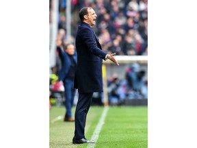 Juventus coach Massimiliano Allegri shouts directions to his players during a Serie A soccer match between Genoa and Juventus at Luigi Ferraris Stadium in Genoa, Italy, Sunday, March 17, 2019.