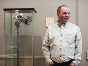 Dartmouth artist Al Hattie poses with his Gord Downie tribute sculpture, created from recycled and upcycled materials called "The Last Show" in the Legacy Room at Halifax City Hall on Friday, March 15, 2019.