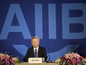 Jin Liqun, the first president of the Asian Infrastructure Investment Bank (AIIB), speaks to journalists during a press conference in Beijing on January 17, 2016.