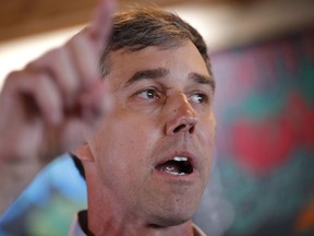 Former Texas congressman Beto O'Rourke speaks to local residents during a stop at the Central Park Coffee Company, Friday, March 15, 2019, in Mount Pleasant, Iowa. O'Rourke announced Thursday that he'll seek the 2020 Democratic presidential nomination.