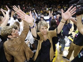 Iowa head coach Lisa Bluder waves to fans after a first-round game against  against Mercer in the NCAA women's college basketball tournament, Friday, March 22, 2019, in Iowa City, Iowa. Iowa won 66-61.