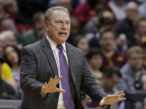 Michigan State coach Tom Izzo gestures to his players during the first half of a first round men's college basketball game against Bradley in the NCAA Tournament in Des Moines, Iowa, Thursday, March 21, 2019.