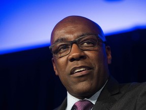 FILE--In this Nov. 2018 file photo, Illinois Attorney General Elect Kwame Raoul address the crowd at his election night party, in Chicago. The Illinois Supreme Court has let stand a less than seven year prison sentence for a white Chicago police officer convicted of killing black teenager Laquan McDonald that some critics characterized as a slap on the wrist. A Tuesday, March 19, 2019 decision denies a bid by Illinois attorney general Kwame Raoul and a special prosecutor to resentence Jason Van Dyke. The February request focused on highly legalistic issues surrounding sentencing guidelines.