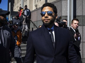 FILE - In this March 26, 2019, file photo, Actor Jussie Smollett leaves the Leighton Criminal Courthouse in Chicago after prosecutors dropped all charges against him. Smollett was indicted on 16 felony counts related to making a false report that he was attacked by two men who shouted racial and homophobic slurs.
