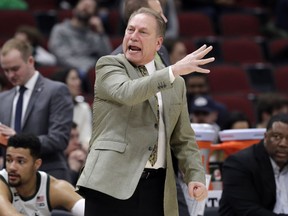 Michigan State head coach Tom Izzo directs his team during the first half of an NCAA college basketball game against Ohio State in the quarterfinals of the Big Ten Conference tournament, Friday, March 15, 2019, in Chicago.
