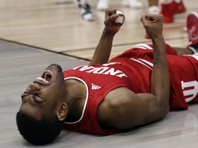 Indiana 's Aljami Durham (1) reacts after scoring a basket against the Ohio State during the first half of an NCAA college basketball game in the second round of the Big Ten Conference tournament, Thursday, March 14, 2019, in Chicago.