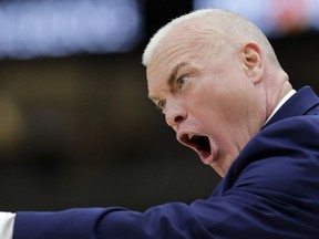 Penn State head coach Patrick Chambers directs his team during the first half of an NCAA college basketball game against the Minnesota in the second round of the Big Ten Conference tournament, Thursday, March 14, 2019, in Chicago.