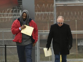 Singer R. Kelly left, walks with his attorney Steve Greenberg right, after being released from Cook County Jail, March 9, 2019, in Chicago.