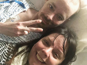 Bridgette Hoskie and her brother Jay Barrett pose for a photo inside an ICU at Yale New Haven Hospital in New Haven, Conn., on Feb. 26, 2019.