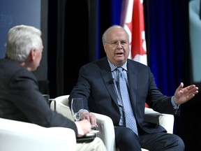 Political strategist and pundit Karl Rove, who served as a Senior Advisor and Deputy Chief of Staff to U.S. President George W. Bush, speaks with Preston Manning during the Manning Networking Conference in Ottawa on Friday, March 22, 2019.