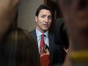 Prime Minister Justin Trudeau speaks to reporters as he leaves the House of Commons following the budget speech in the House of Commons on Parliament Hill in Ottawa on Tuesday, March 19, 2019.