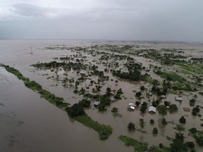 This photo issued Tuesday March 19, 2019, taken within last week and supplied by World Food Programme,  flood waters cover large tracts of land in Nicoadala, Zambezia Province of Mozambique. Rapidly rising floodwaters have created "an inland ocean" in the country endangering many thousands of families, as aid organizations scramble to rescue and provide food to survivors of Cyclone Idai.