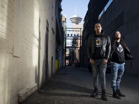 Quinton Nyce, left, and Darren Metz of Snotty Nose Rez Kids pose for a photo in downtown Vancovuer, Tuesday, Feb. 26, 2019. "The Average Savage," the rap duo's 2017 sophomore album is nominated at the Juno Awards in the Indigenous Music album category.