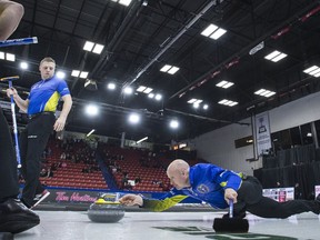 Team Alberta skip Kevin Koe makes a shot during the sixth draw against team New Brunswick at the Brier in Brandon, Man. Monday, March, 4, 2019.