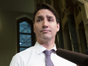 Prime Minister Justin Trudeau speaks with reporters on Parliament Hill, March 20, 2019.