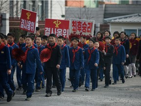 Children march to encourage voters to cast their ballots during voting for the Supreme People's Assembly elections, in Pyongyang on March 10, 2019. - North Koreans went to the polls for an election in which there could be only one winner. Leader Kim Jong Un's ruling Workers' Party has an iron grip on the Democratic People's Republic of Korea, as the isolated, nuclear-armed country is officially known.