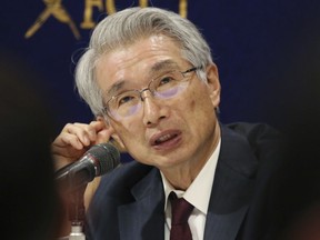Junichiro Hironaka, Chief defense lawyer of former Nissan chairman Carlos Ghosn speaks during a press conference in Tokyo, Monday, March 4, 2019. Hironaka said Monday that Ghosn promised to accept camera surveillance as a way to monitor his activities if he is released from the detention center where he has been held since his Nov. 19 arrest. Ghosn has been charged with falsifying financial reports and breach of trust.