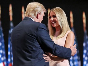 Donald Trump greets his daughter Ivanka Trump on stage during the Republican National Convention  in Cleveland, Ohio, U.S., on Thursday, July 21, 2016.