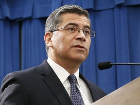 FILE - In this Feb. 15, 2019 file photo, California Attorney General Xavier Becerra speaks at a news conference in Sacramento, Calif. Becerra and other Democratic lawmakers are seeking to overturn new obstacles the Trump administration set up for women seeking abortions, including barring taxpayer-funded family planning clinics from making abortion referrals. Becerra announced Monday, March 4, 2019 that the Democratic-led state will file a federal lawsuit seeking to block the Health and Human Services Department's new family plan rule.